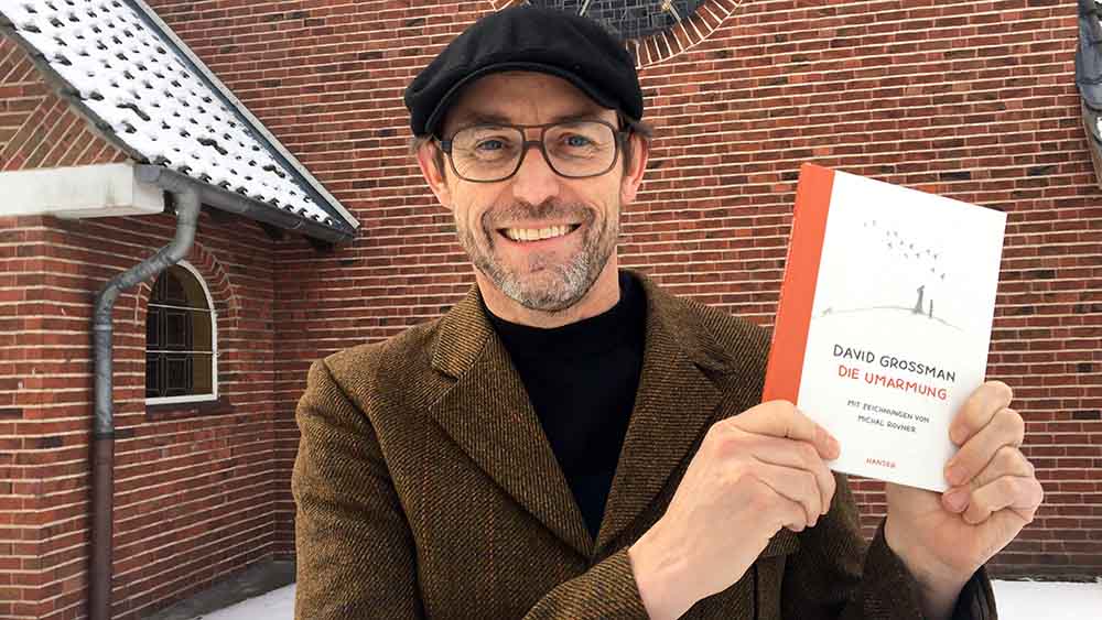 Image - Eine Umarmung per Buch