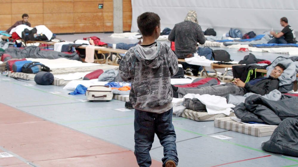 Provisorische Erstaufnahmeeinrichtung für Flüchtlinge in einer Turnhalle 