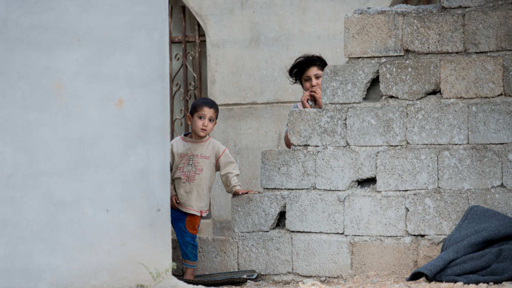 In Konfliktgebieten rund um die Welt erleiden Mädchen und Jungen ein extremes Ausmaß an Gewalt, wie hier im Irak (Foto von 2018)