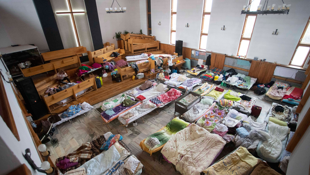 Flüchtlingsnotunterkunft in einer polnischen Kirche