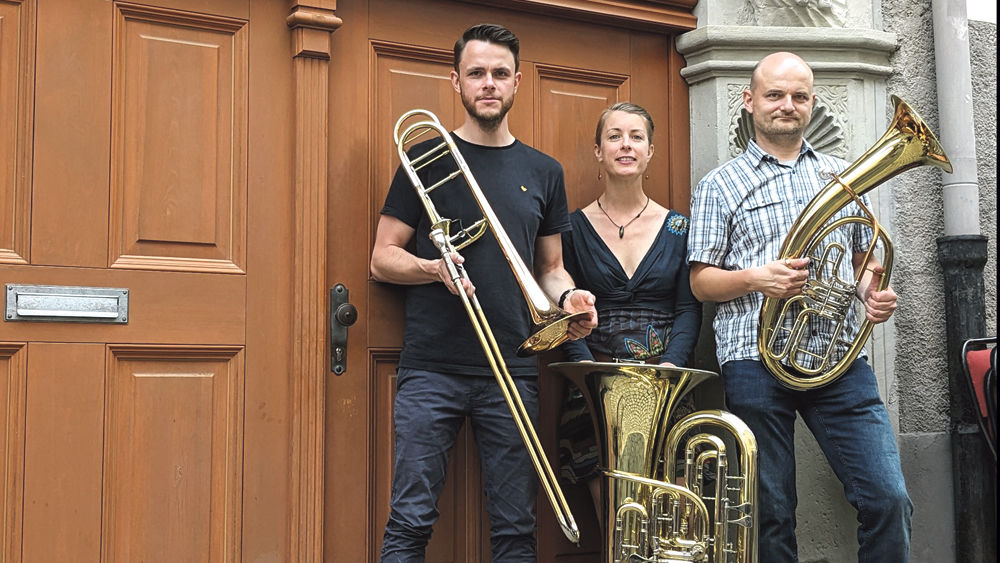 Drei Mitglieder der Posaunenchöre in Görlitz mit ihren Instrumenten