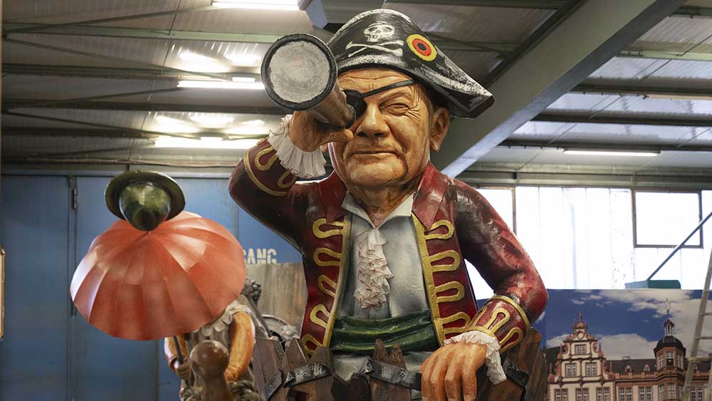 Image - Karnevalisten zeigen Scholz als Kapitän auf sinkendem Schiff