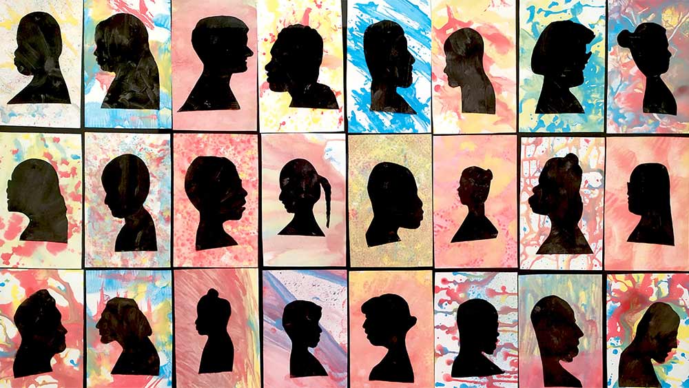 Schattenschnitt-Porträts von Kindern und Jugendlichen der August Hermann Francke-Schule, entstanden im Projekt „Ich bin einzigartig“.