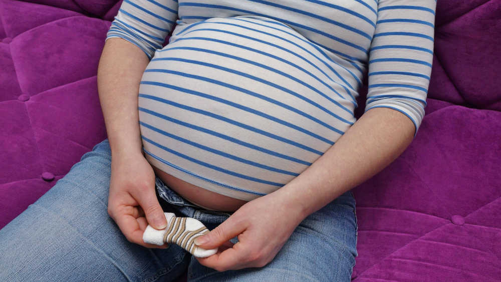 Image - Mutterglück mit Schuldenberg