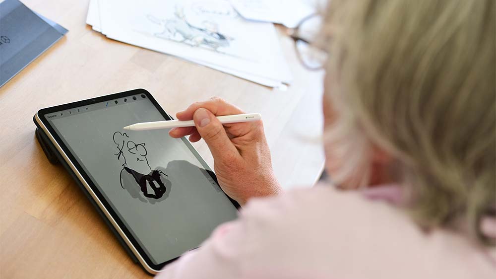 Wen trifft es diesmal? Hier entsteht gerade eine Karikatur