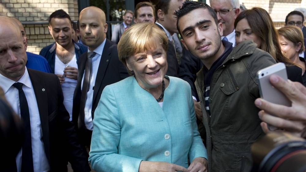 Dieses bekannte Foto mit Ex-Kanzlerin Angela Merkel und einem Geflüchteten dürfte es ins Museum schaffen