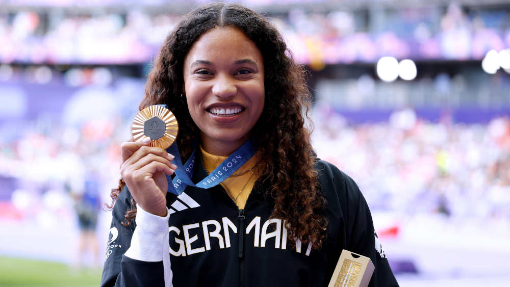 Die gefeierte Athletin Yemisi Ogunleye hat deutsches Gold im Kugelstoßen geholt 